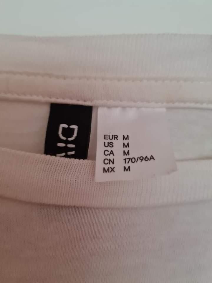 Biała damska bluzka marki H&M