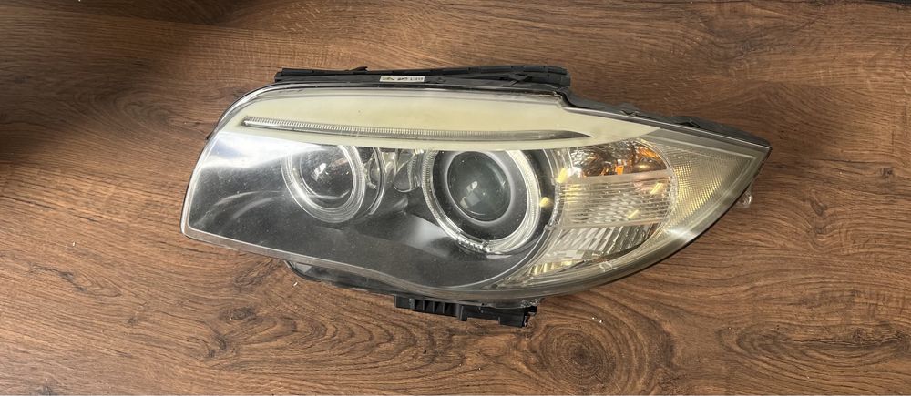 Farol bmw seri 1 lci esq