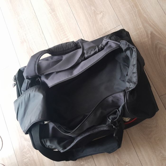 Duża Torba podróżna na kółkach Fila na zamek z wyciąganą rączką