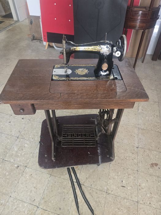 Máquina  de costura  singer