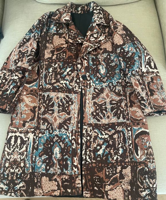 Casaco todo forrado no interior