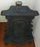 Lareira de canto em ferro fundido