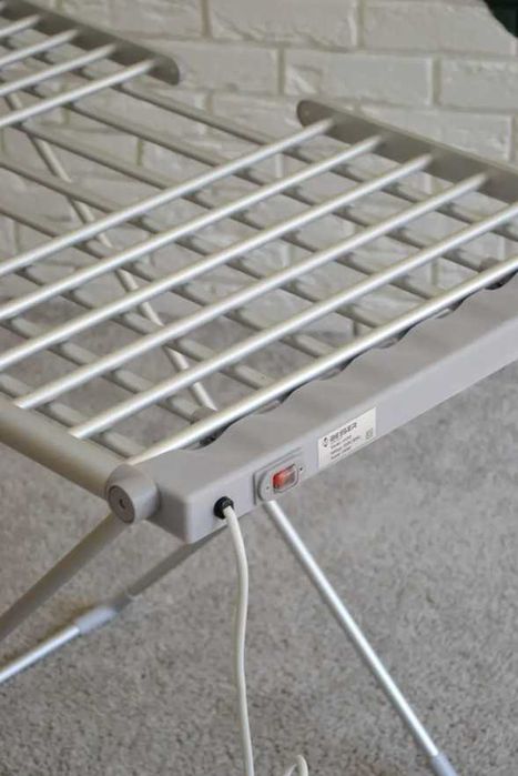 розкладна електрична сушарка для одягу