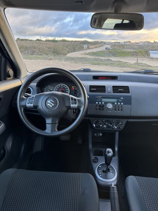 Suzuki Swift 2006 Automatico poucos kms 4.8 l/100 mto economico