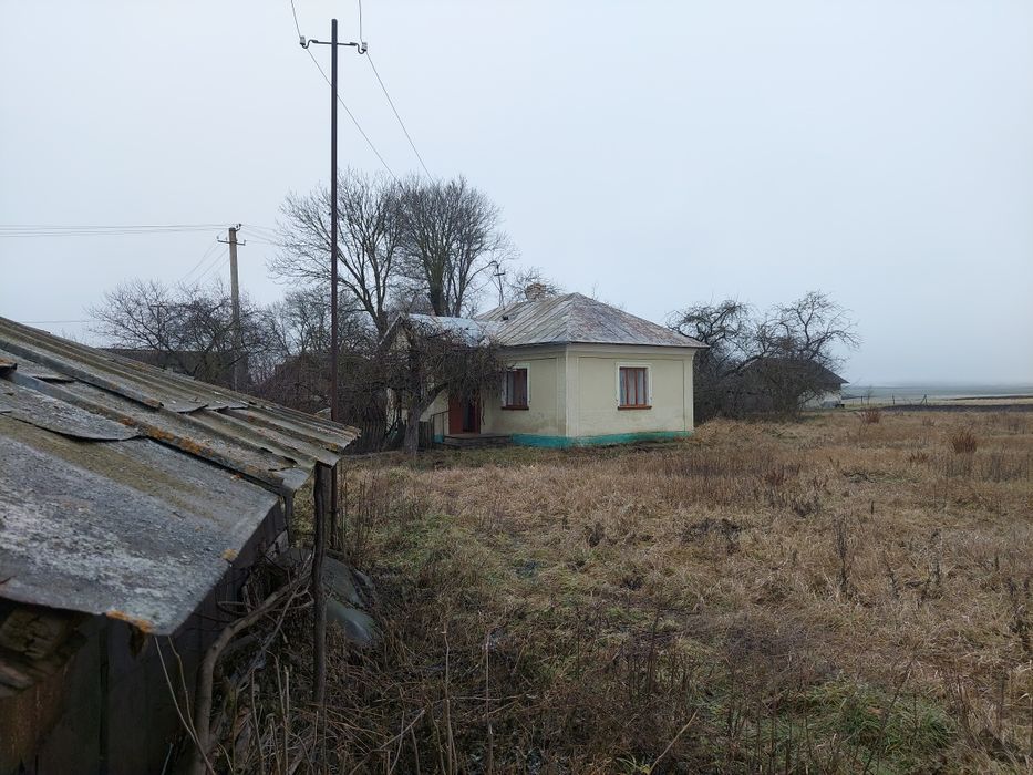 Продаж будинку з літньою кухею і прибудовами