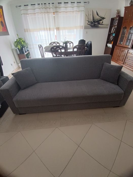 Sofá-cama cinzento 
Vendo so