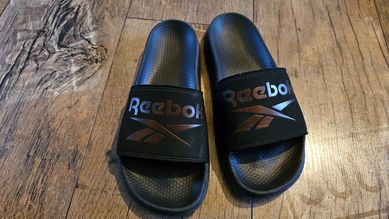 Klapki Reebok damskie czarno-złote rozmiar 36