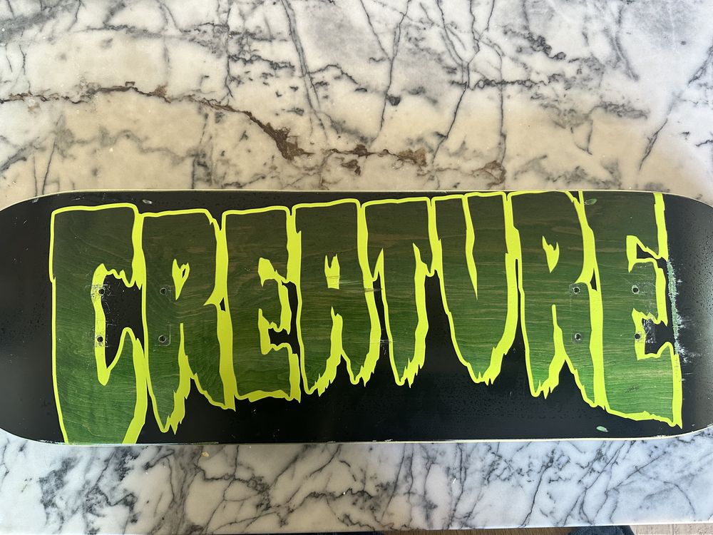 Tábua de skate da creature