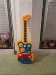 Vendo Guitarra RIK&ROK para Criança a pilhas muito bonita como nova