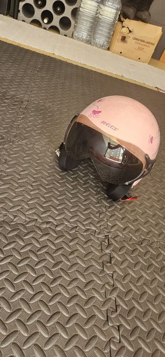 Capaete usado mulher