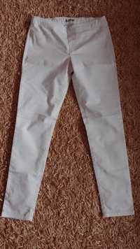 Długie białe spodnie na gumkę
