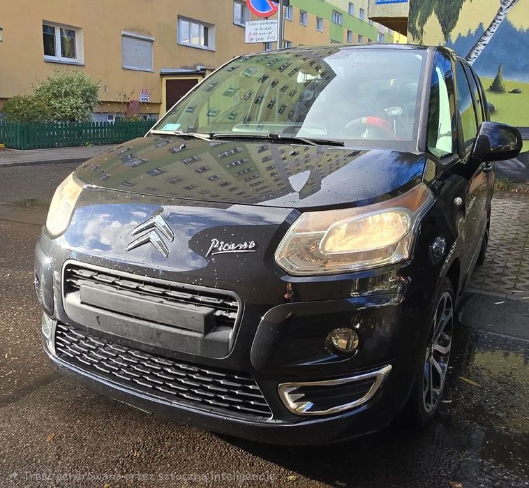 Citroën C3 Picasso Elegancki, czarny ze szklanym dachem.