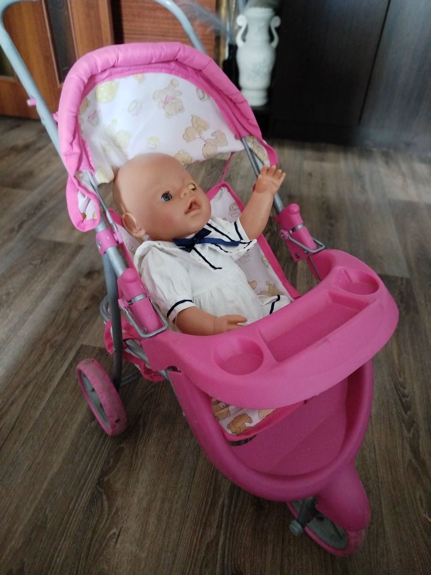 Продам игрушечную детскую коляску и одежду