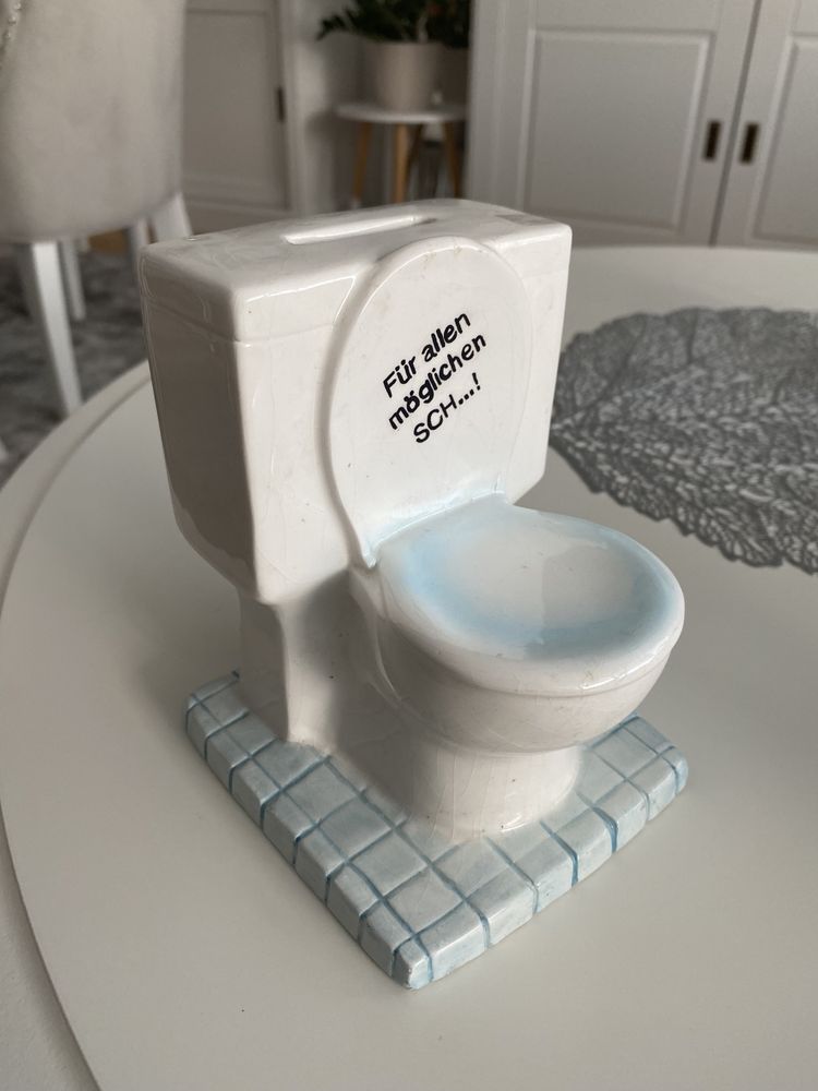 Zabawna skarbonka toaleta