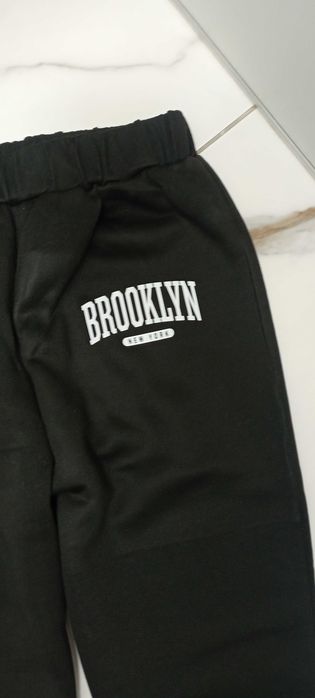 Нові теплі спортивні штани на зріст 160 см