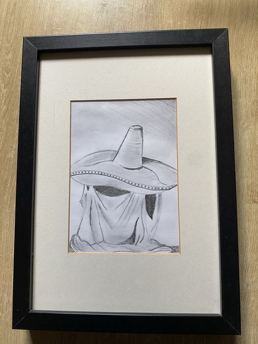 Czarna drewniana ramka z grafiką