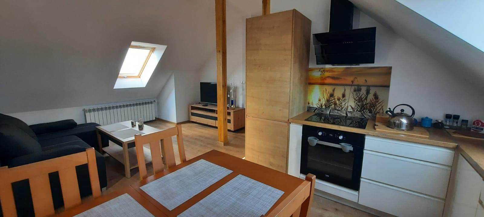 Apartament Gaj nad Jeziorem . Pokoje też  dla pracowników . Kajaki