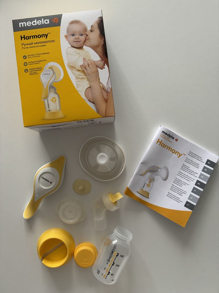 Молокосос Medela ручний + пакети для молока