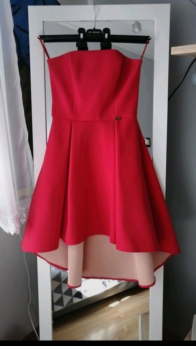 Asymetryczna sukienka kieszenie