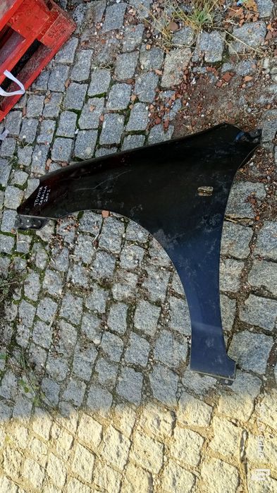 Guarda lamas Toyota Corolla 2002 esquerdo