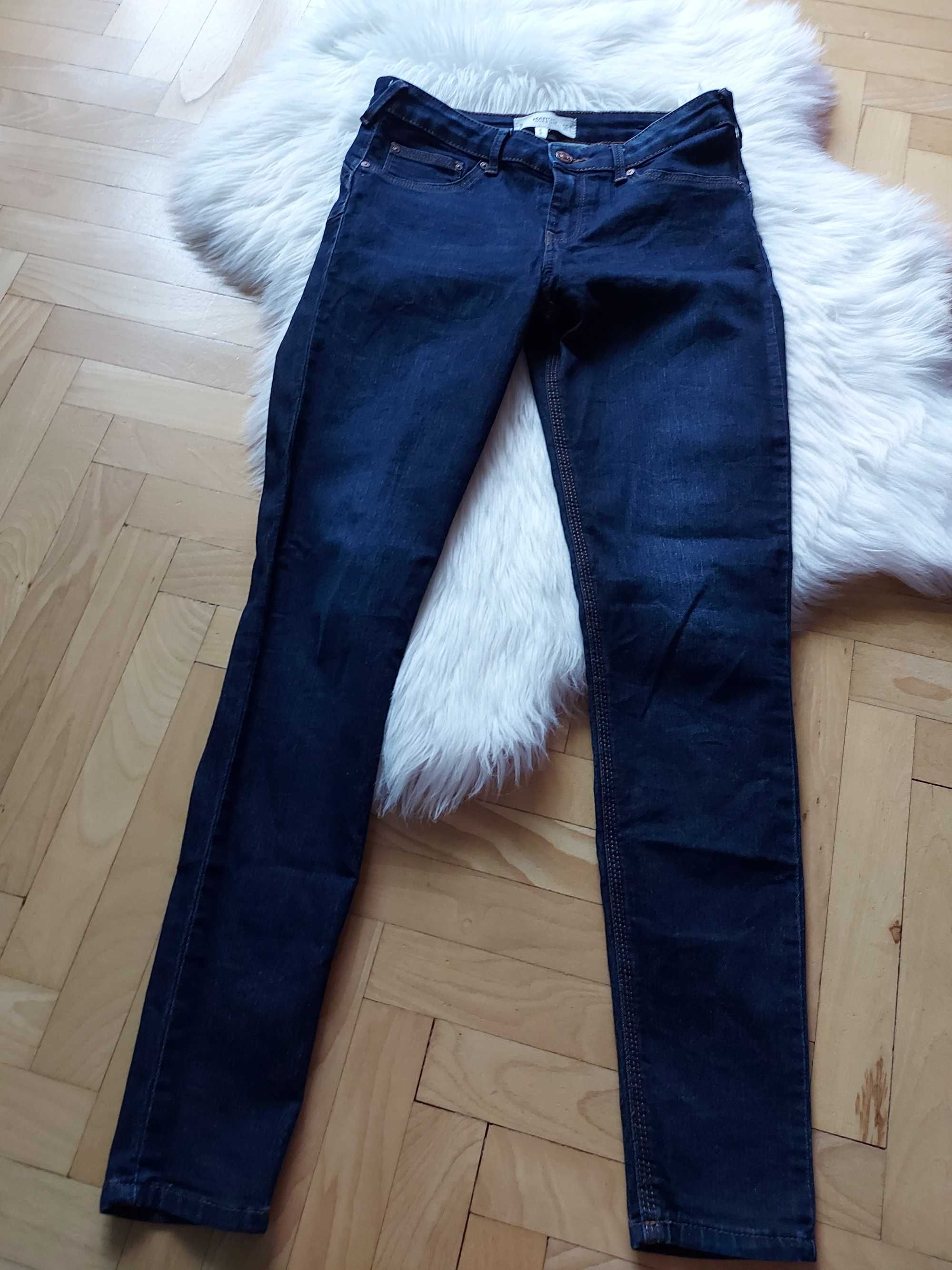 Spodnie jeans Mango