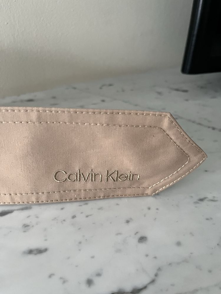 Calvin Klein Nowy beżowy materiałowy szeroki pasek damski/unisex 140cm