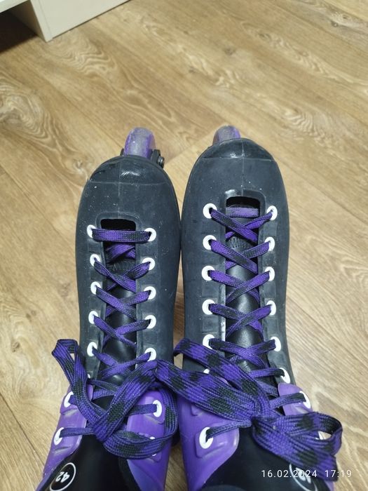 Роликовые коньки