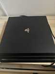 Ps4 pro 1TB 4 pady + 7 gier