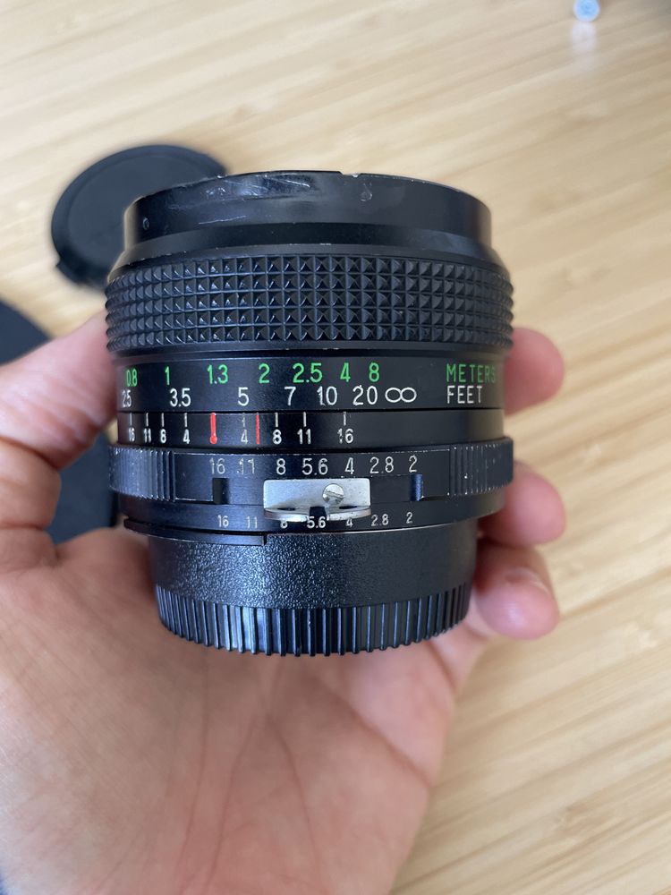 Lente Vintage Vivitar 28mm f2.0 manual para Nikon emount
