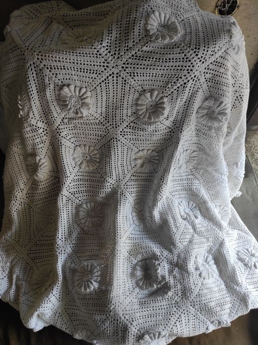 Colcha de renda em roseta