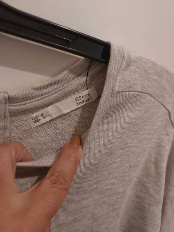 Sfera blusa cinzenta