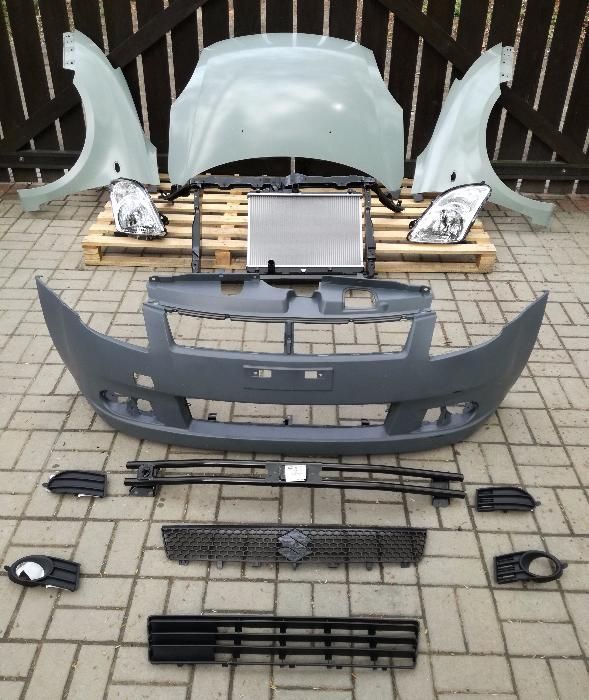 SUZUKI SWIFT 2005 - zderzak przedni nowy