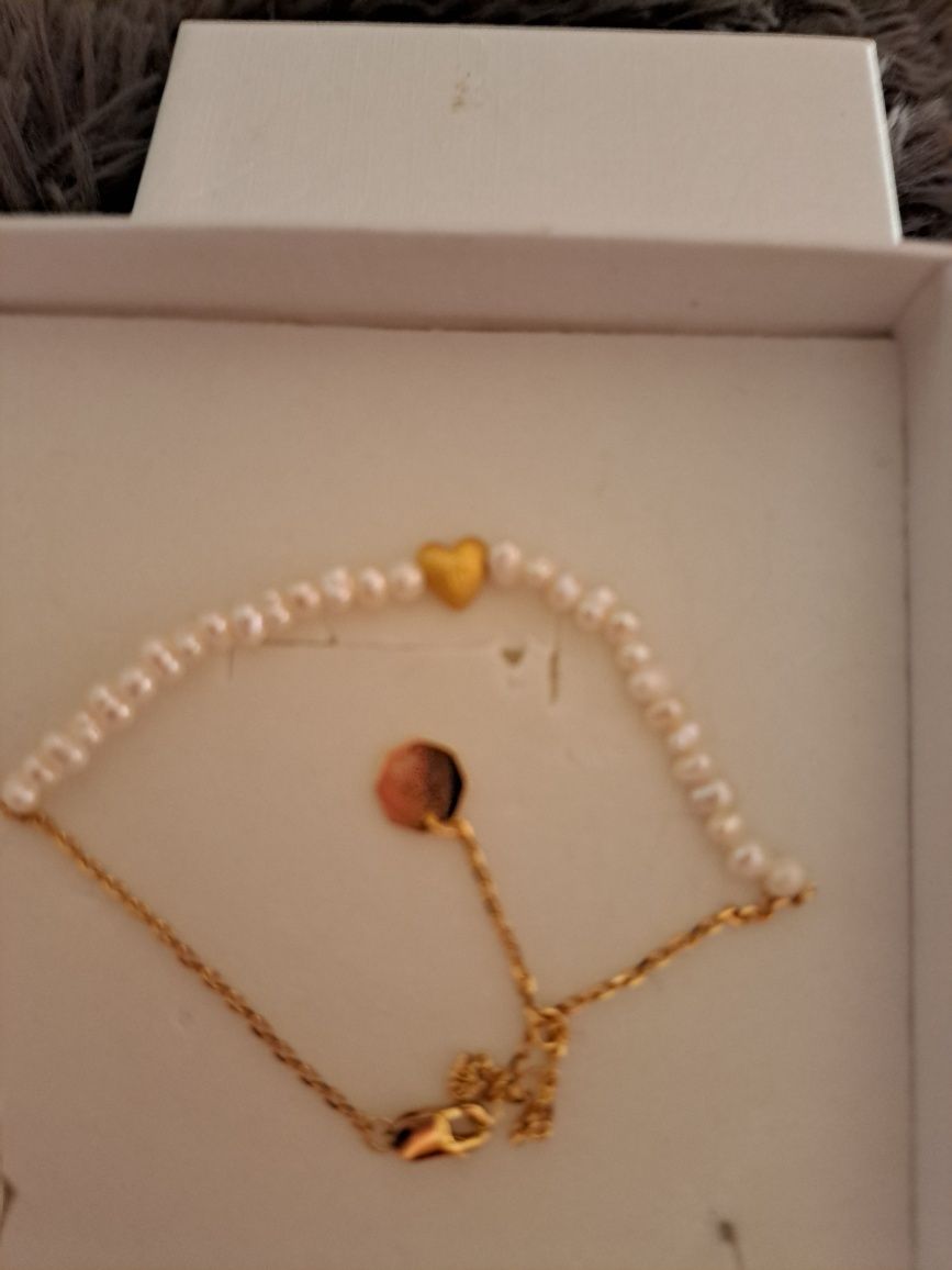 Pulseira em prata dourada
