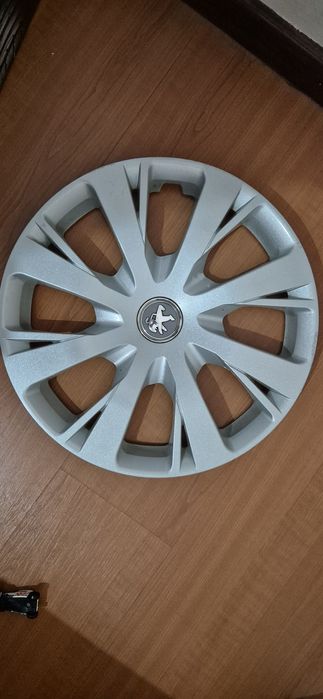 Tampão peugeot 208 aro 15"