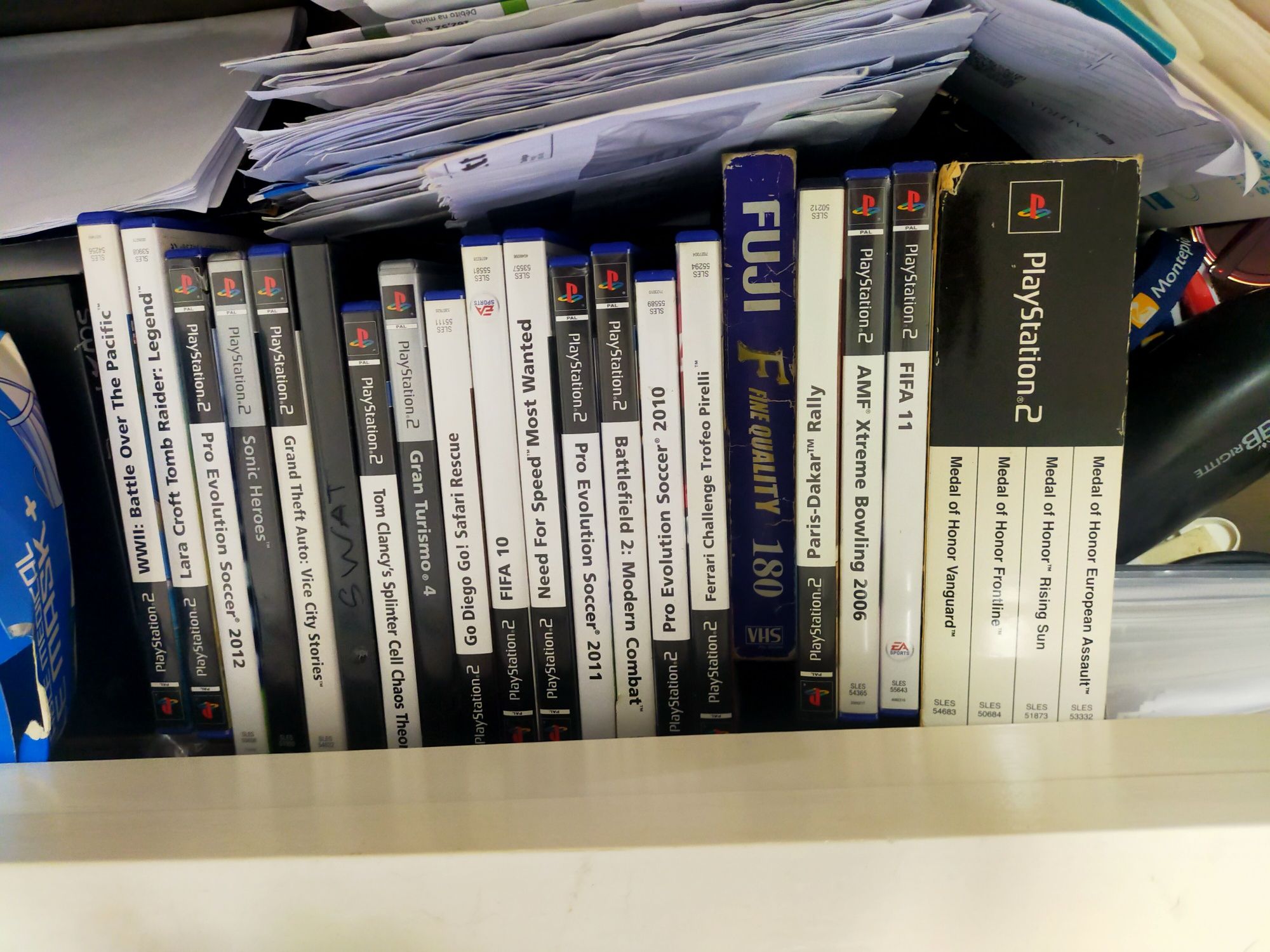 PlayStation 2 com vários jogos