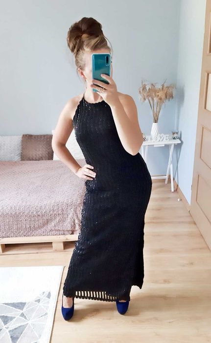 Długa sukienka na sylwestra Samantha Faiers czarna z rozcięciem brokat