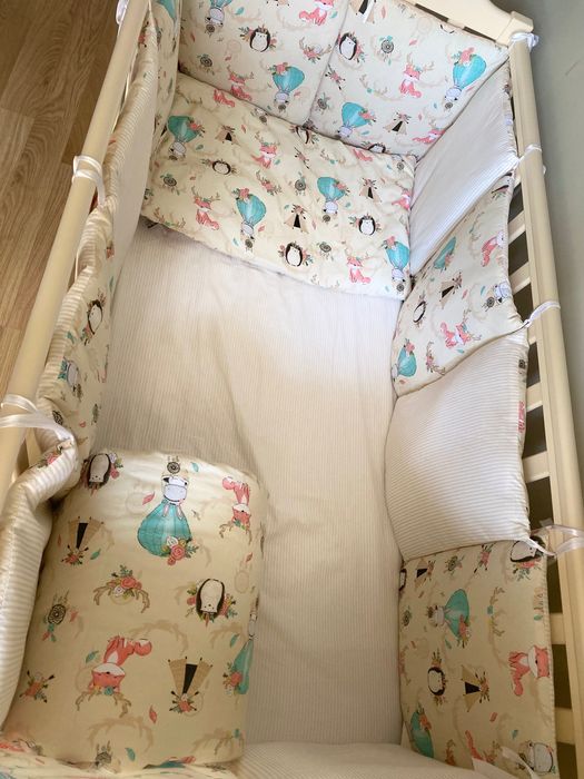 Дитяче ліжечко-манеж