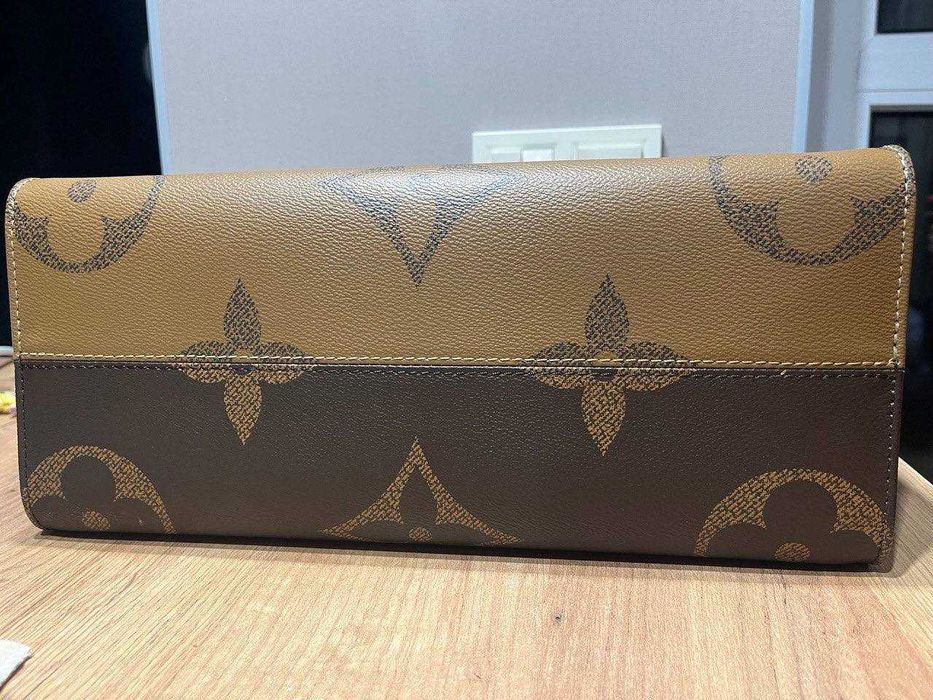 Оригинальная сумочка Луи Витон Louis Vuitton On The Go б/у с чипом