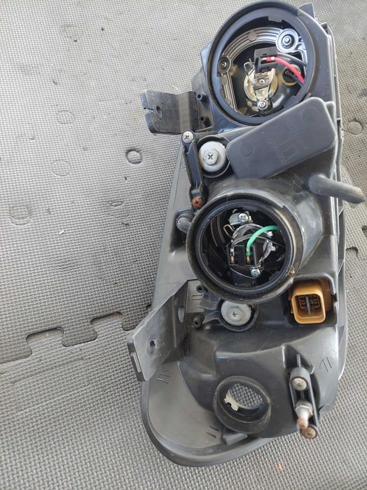 farol esq Chevrolet captiva