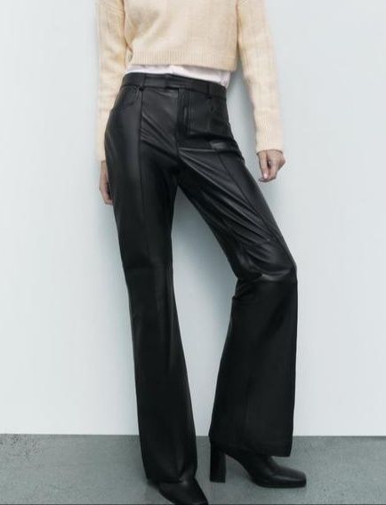 Шкіряні штаны чорного кольору з кишенями