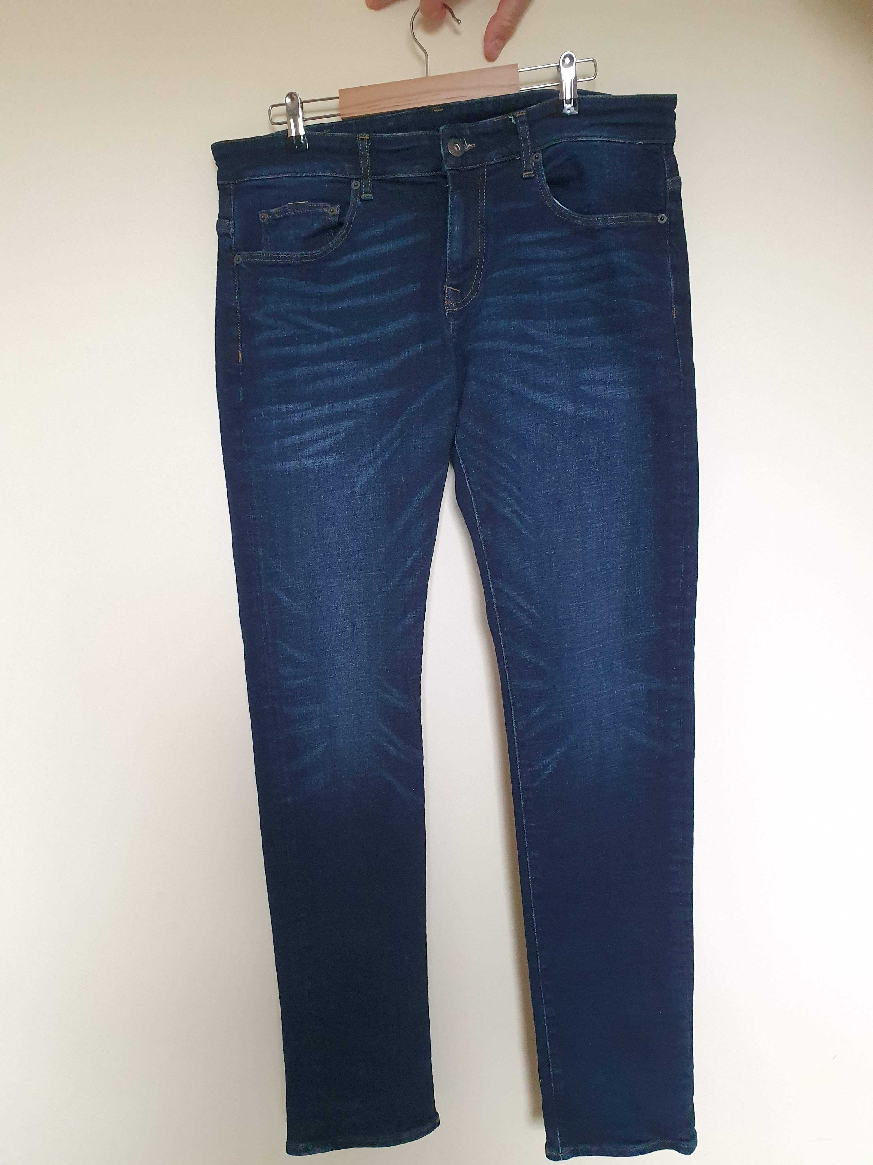 Cross Jeansy F 152-125 Niebieski Tapered Leg W32 L34