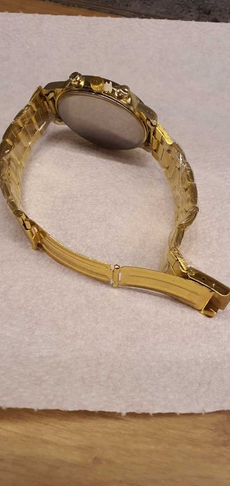 Elegancki zegarek meski.koloru złoto