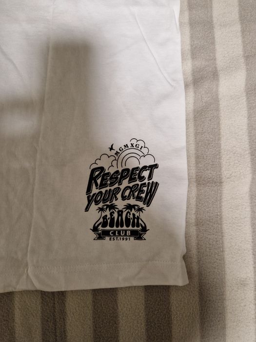 T-shirt branca nova L