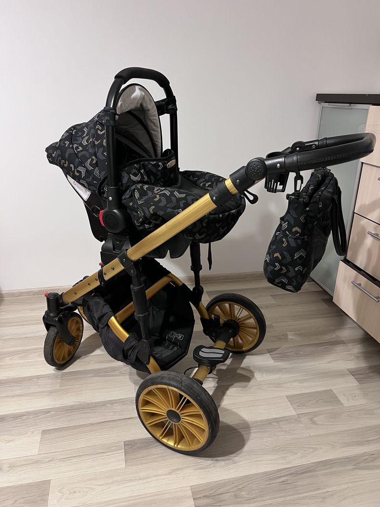 Стильна дитяча коляска 3в1 фірми Ottis