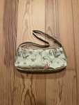 Bolsa pequena com figuras