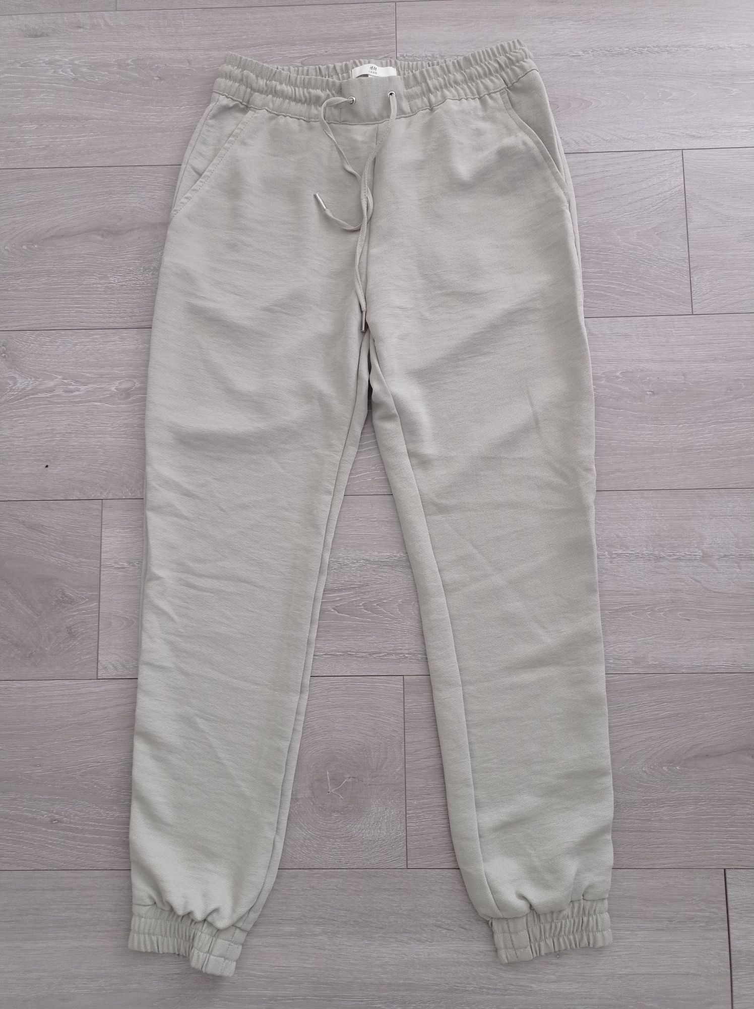 Nowe spodnie materiałowe H&M r.36