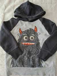 Sweatshirt monstro com capuz
Língua para dentro ou para fora
Olhos com