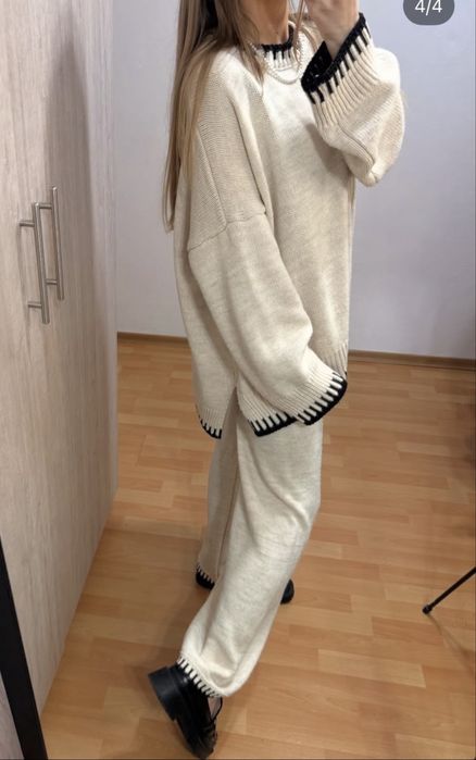 Жіночий вʼязаний костюм