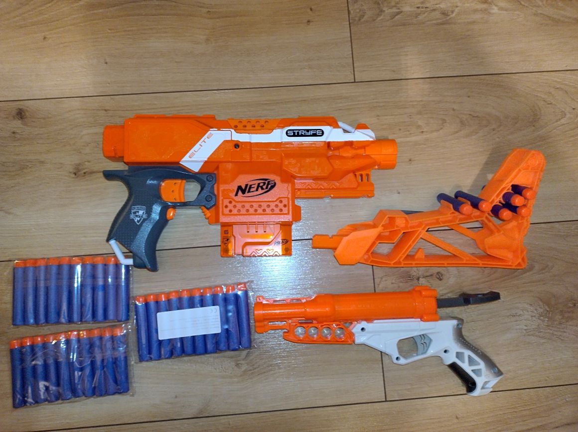 NERF pistolet 2szt + strzałki. Blaster na baterie. Plus strzałki 3 op.