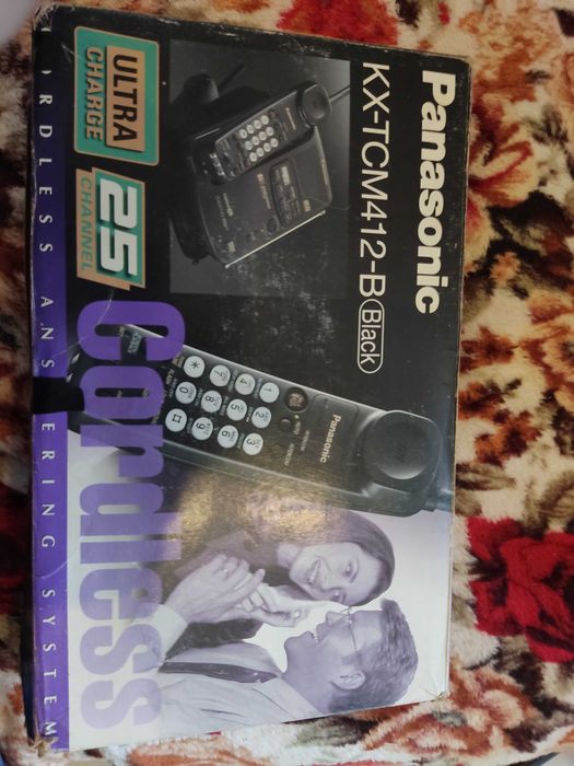 Радио телефон Panasonic KXTCM412B с цифровым автоответчиком